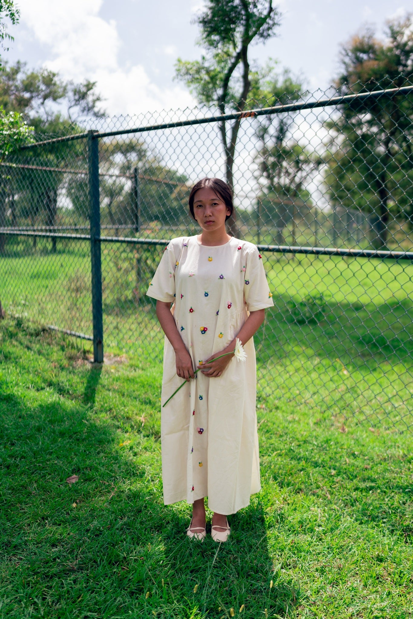 TREEJM's Dear Friend Dress is a high-quality, handwoven cotton dress that will keep you comfortable and stylish all day. Crafted with 100% cotton, the breathable fabric will keep you cool in any season. This timeless dress is perfect for any occasion.