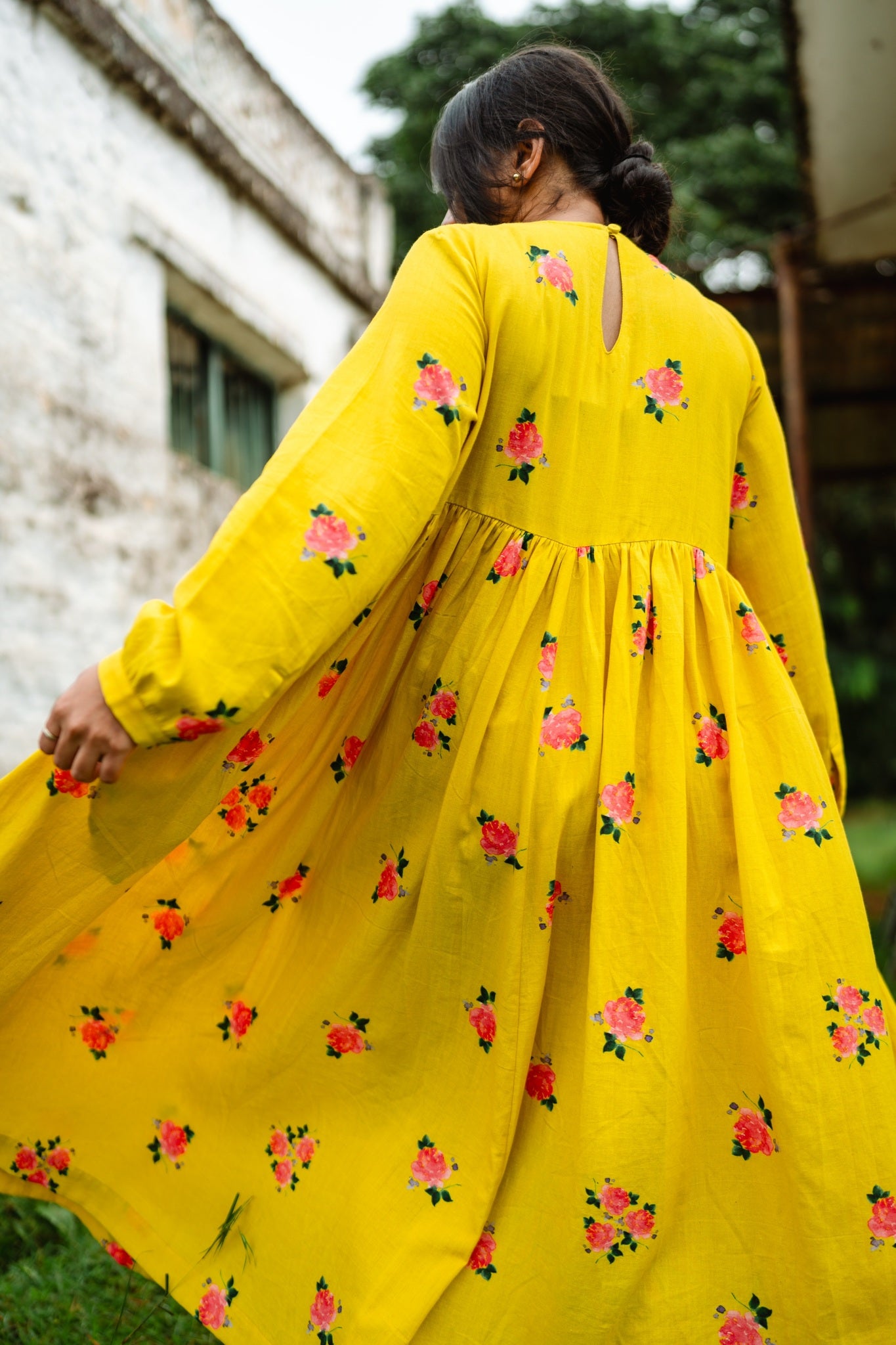 TREEJM's Rangeela Dress in vibrant lime yellow is handwoven cotton perfection, with flowing gathers ideal for sunny days. Enjoy its comfort and distinct print.